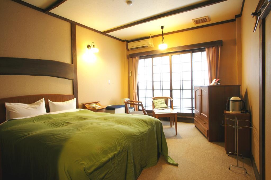 Hotel Oyado Kurokawa Aso Zimmer foto